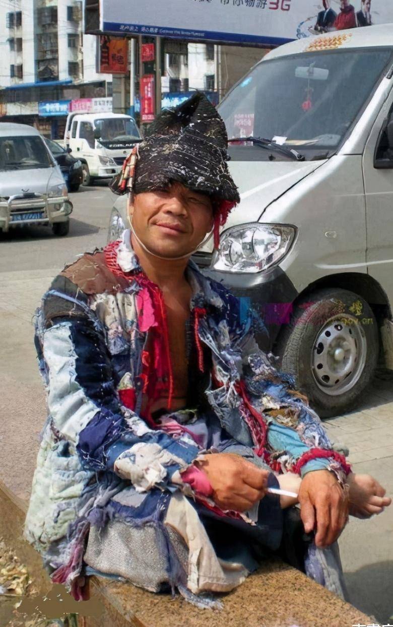 他是
