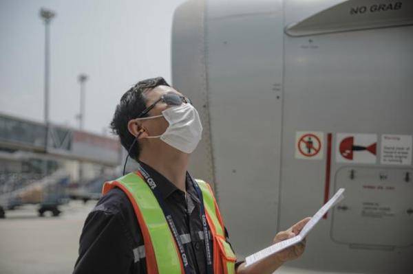 员李荣|无惧“烤”验，青岛机场人坚守一线保平安畅行