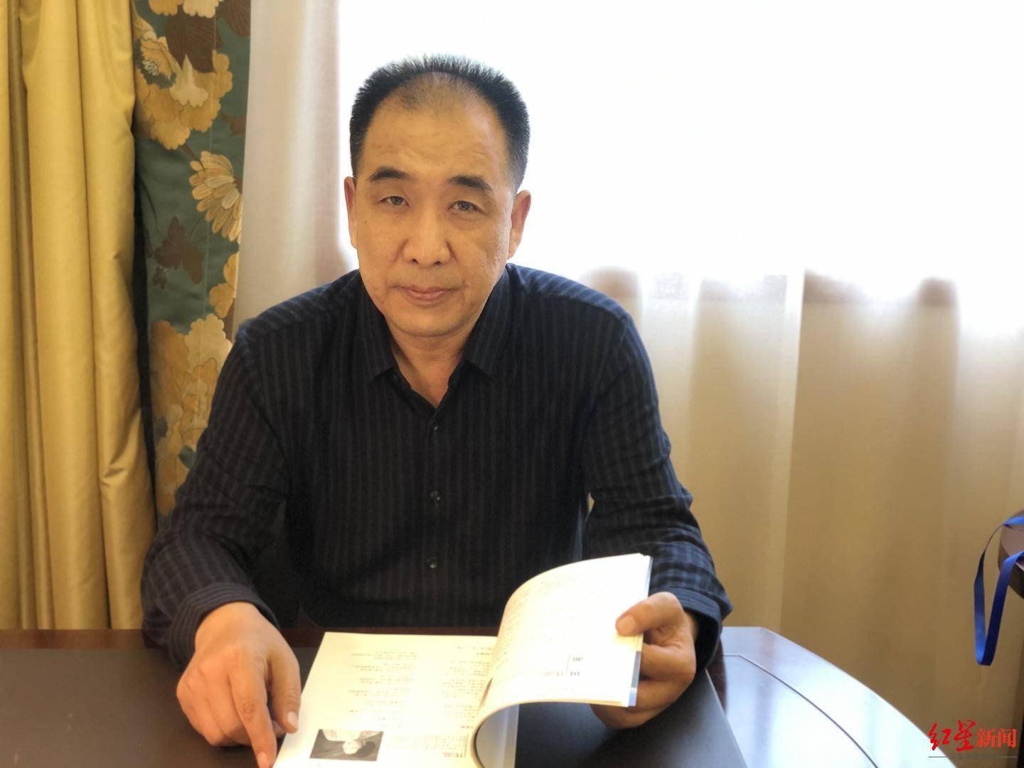 甘肃民族师范学院副校长,诗人阿信