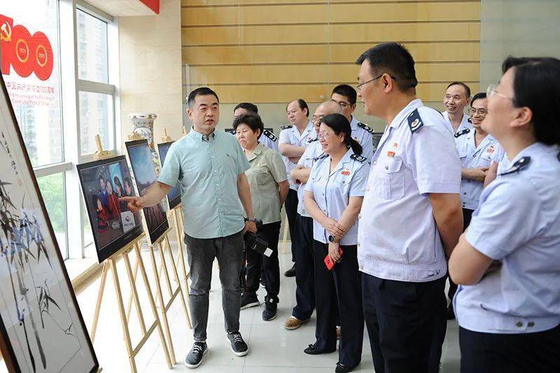 基层动态江都区税务局举办庆祝建党100周年主题书画摄影展