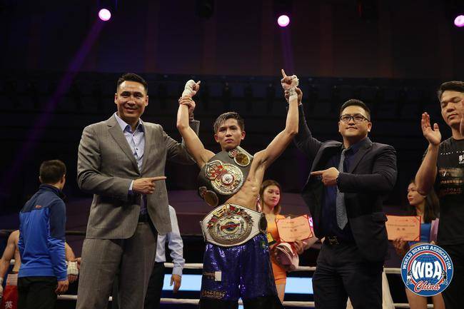 促进祖国共同繁荣奥运冠军张小平大力挖掘港澳拳击明日之星