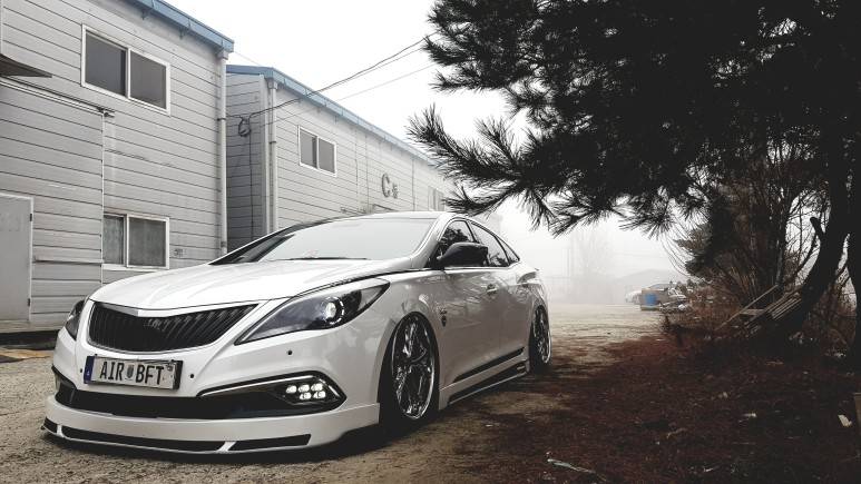 低趴风格 现代雅尊hg改装气动避震悬挂低姿态案例韩国店家分享