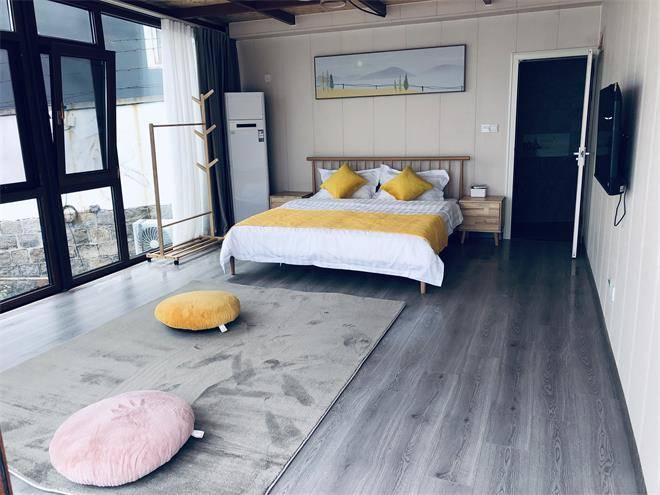 山东青岛崂山幸福海边民宿位于崂山仰口景区白云洞和华严寺山脚下