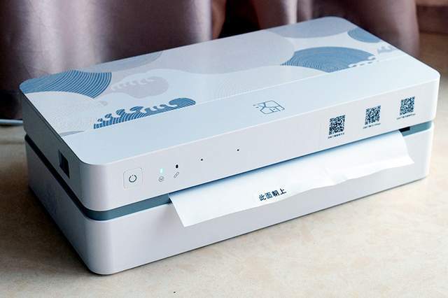 无墨打印热敏成像内置天猫精灵的汉印智能打印机u100测评