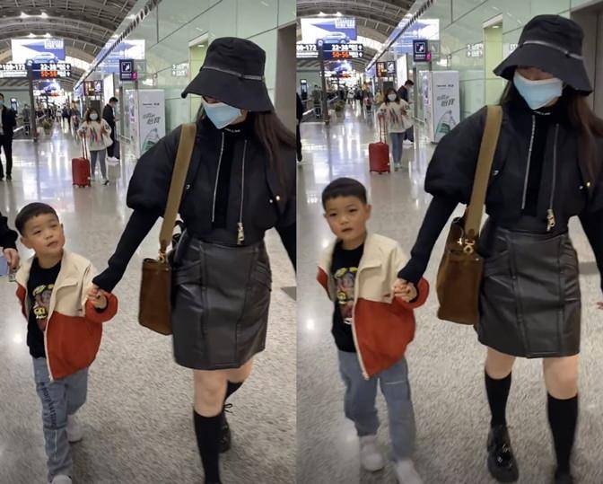 个性|张靓颖恋爱后大变样,穿露脐装配短裙长袜做学生妹,牵男孩太调皮