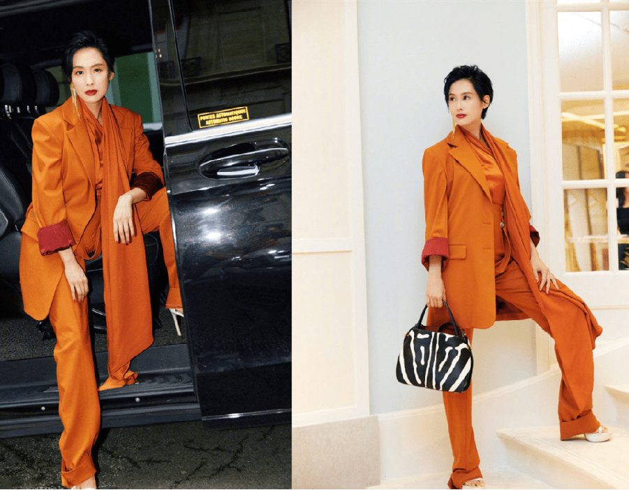 显得|71年的朱茵都快50岁了,但感觉不会老似的,穿黑西装都挺有活力