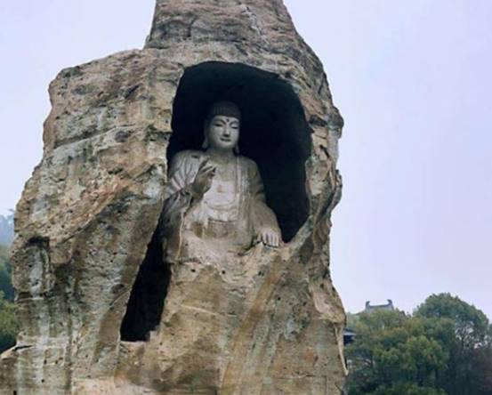 浙江最珍贵的石佛，高度达到20.8米，历经三代人打造完成