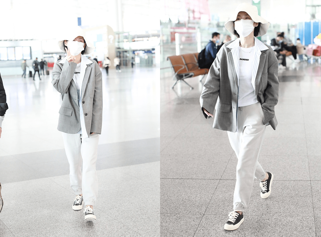 显得|张嘉倪和买超的身高差距有点大,但穿搭真不赖,黑白配层次感挺强