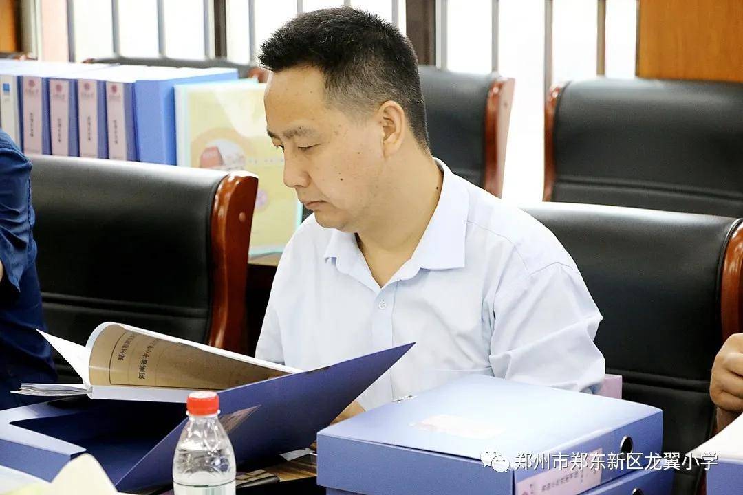 东新区|建一座有温度的校园图书馆—郑东新区龙翼小学迎接河南省示范性图书馆评估检查