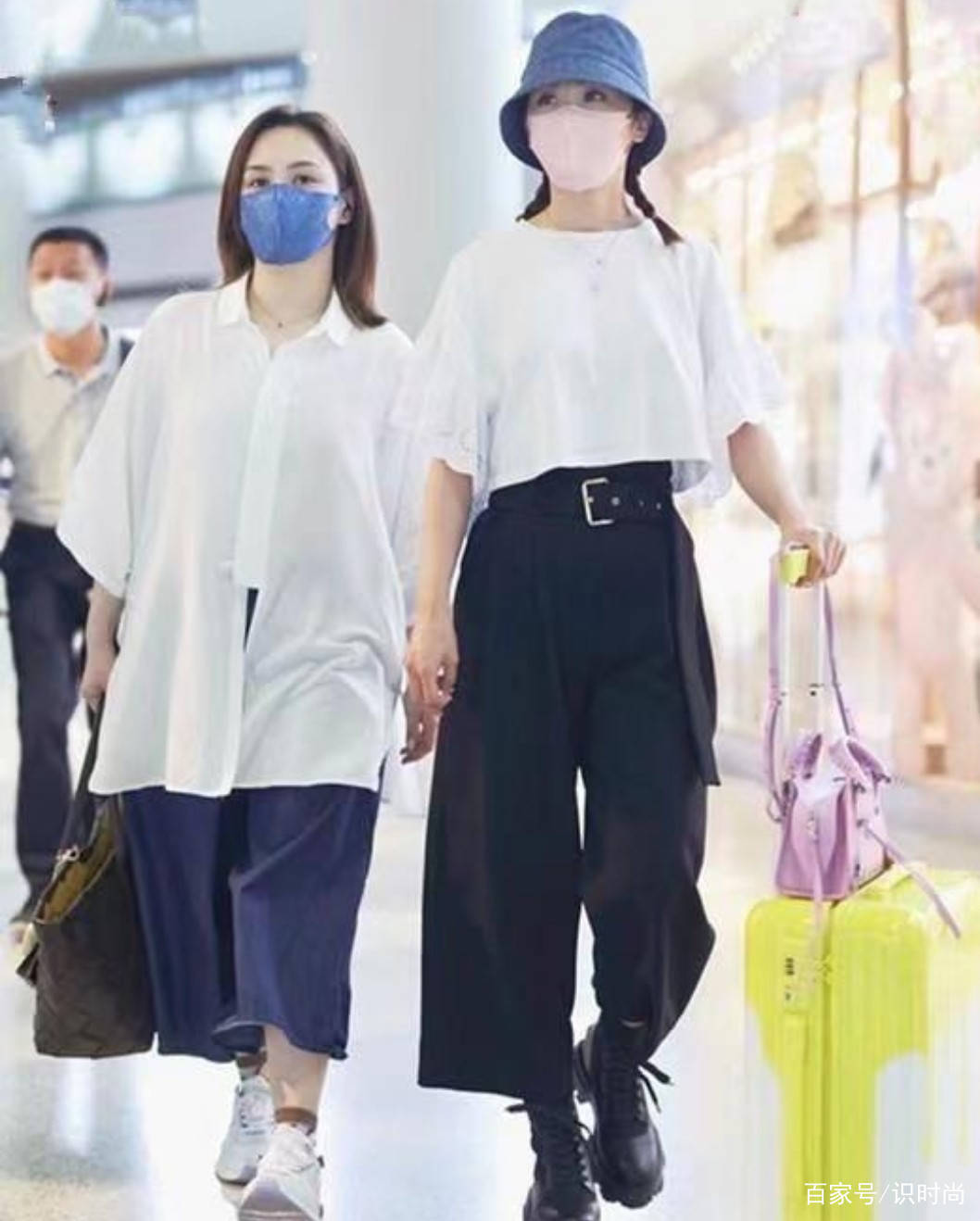 黑色 Twins同框现身机场，两人身材不在同一级别，阿娇要穿宽松装遮肉