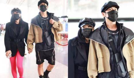 网友 51岁钟丽缇和老公机场被拍！穿粉色裤子造型夸张，亲密靠老公肩上