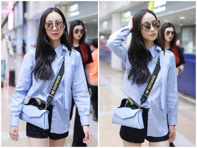 黑色 36岁韩雪黑超遮面走机场，衬衫搭配短裤随意休闲，甘蔗腿实在惊艳