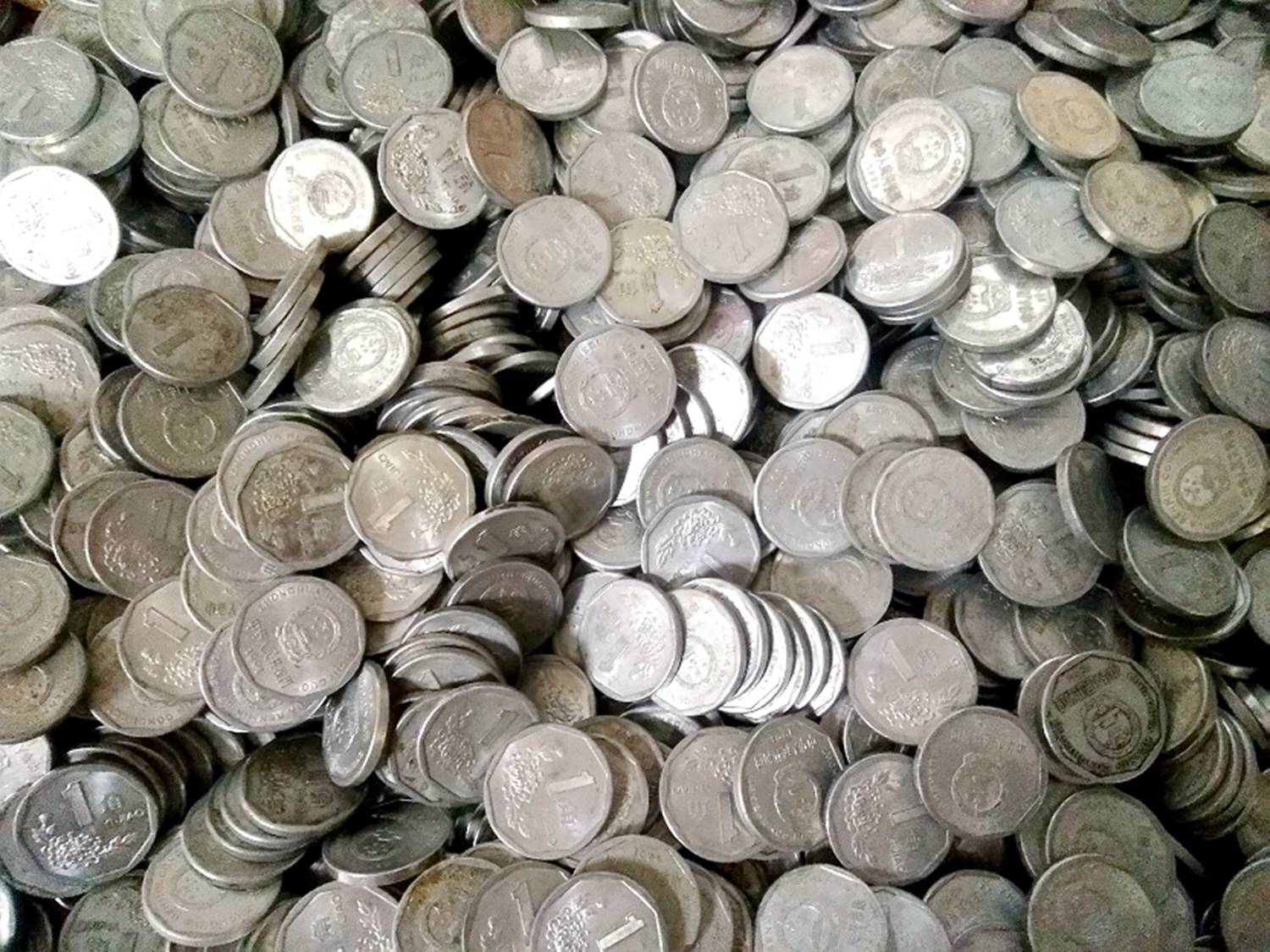 原创这一堆1角硬币,有人说它增值12倍,你手里或许也有!