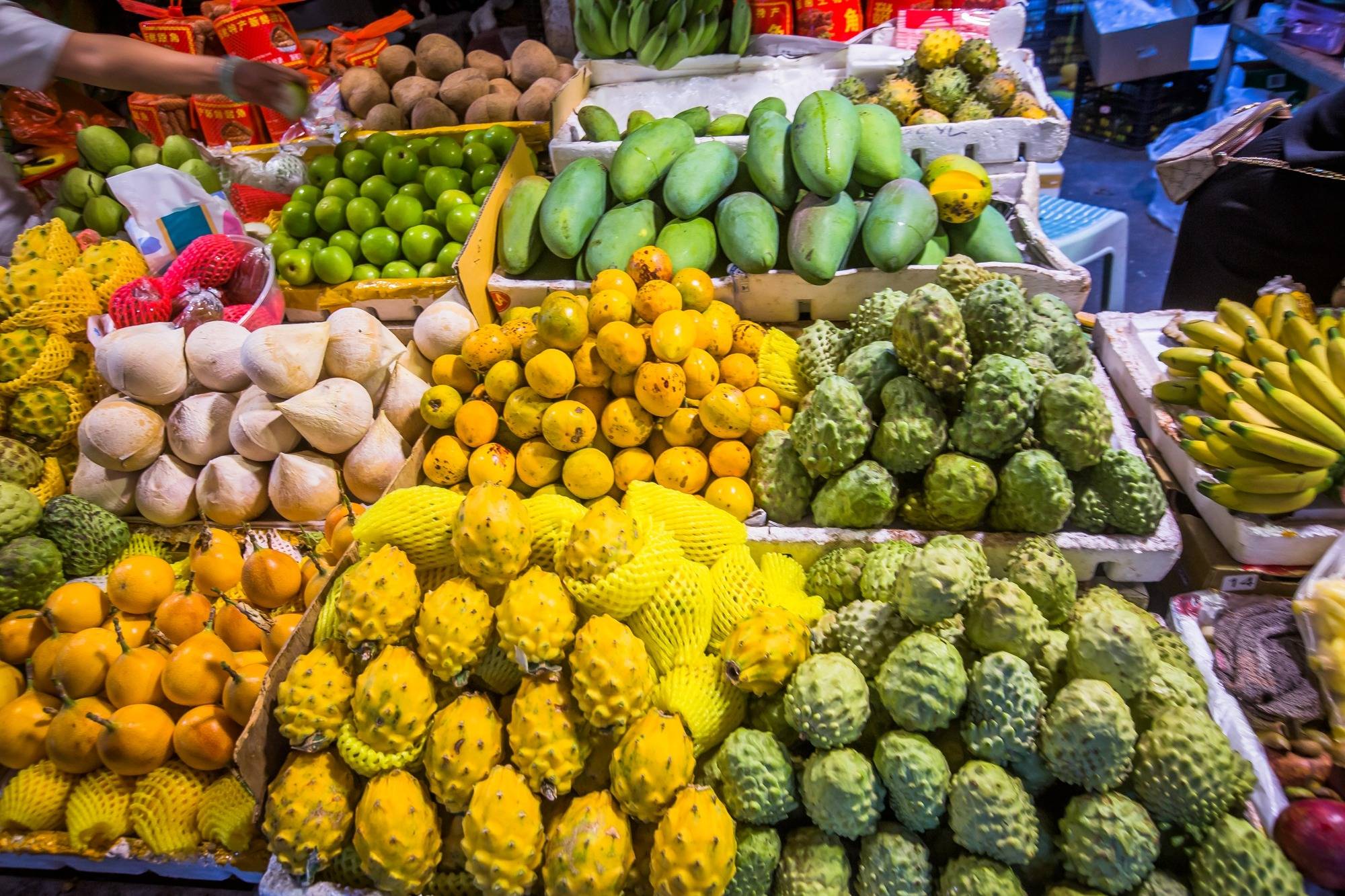 西双版纳曼阁市场,这处水果批发中心,吸引了众多游客前来打卡