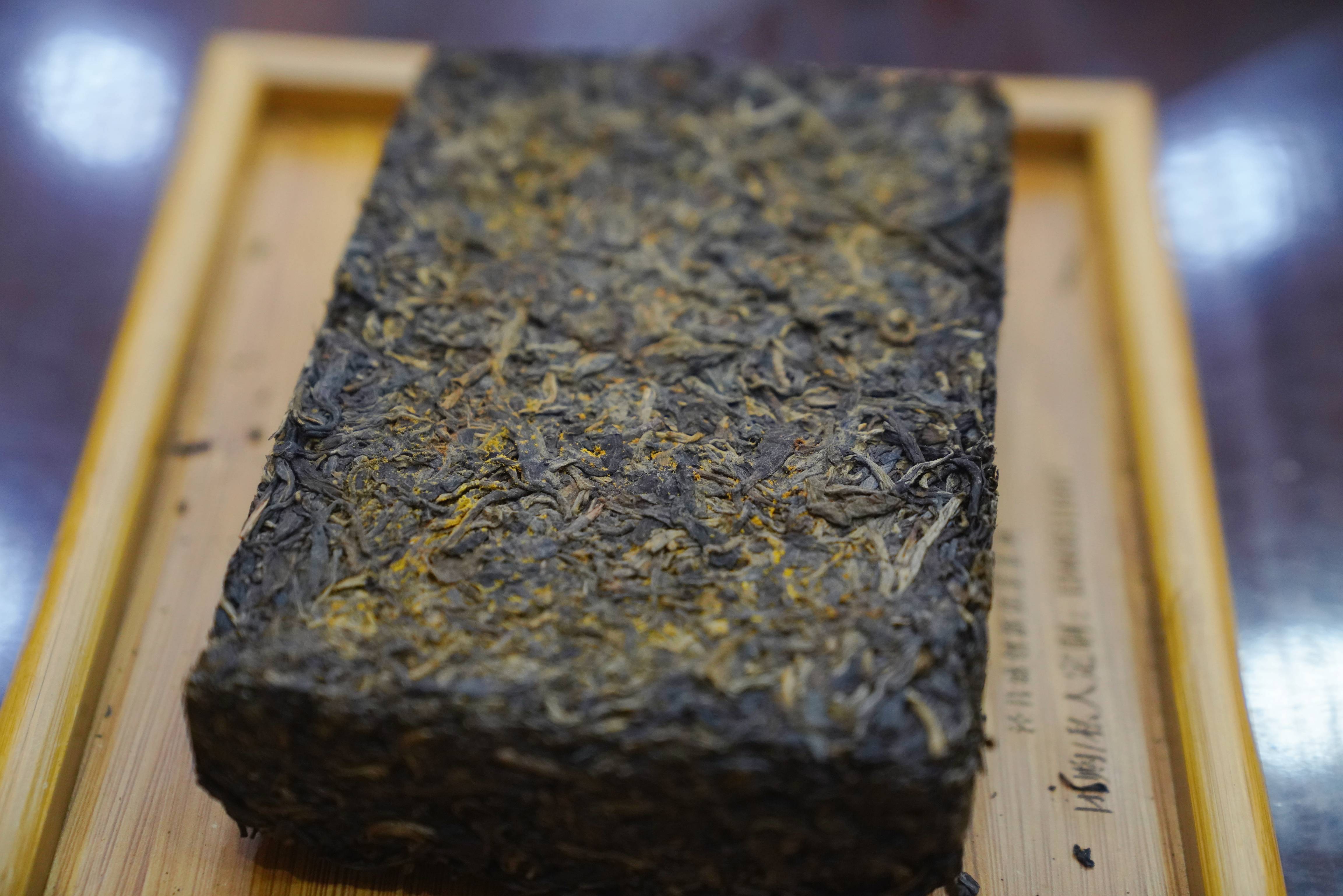 文化内涵,形成了"一馆一园一镇一村"产业集群(即根社茯茶非遗传承馆