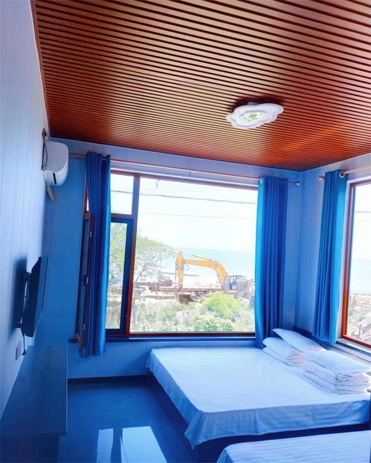 辽宁葫芦岛市兴城市觉华岛海之蓝宾馆距浴场一路之隔海鲜自由