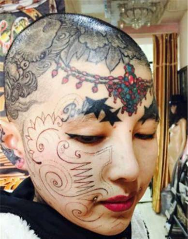 中国脸上纹身男图片