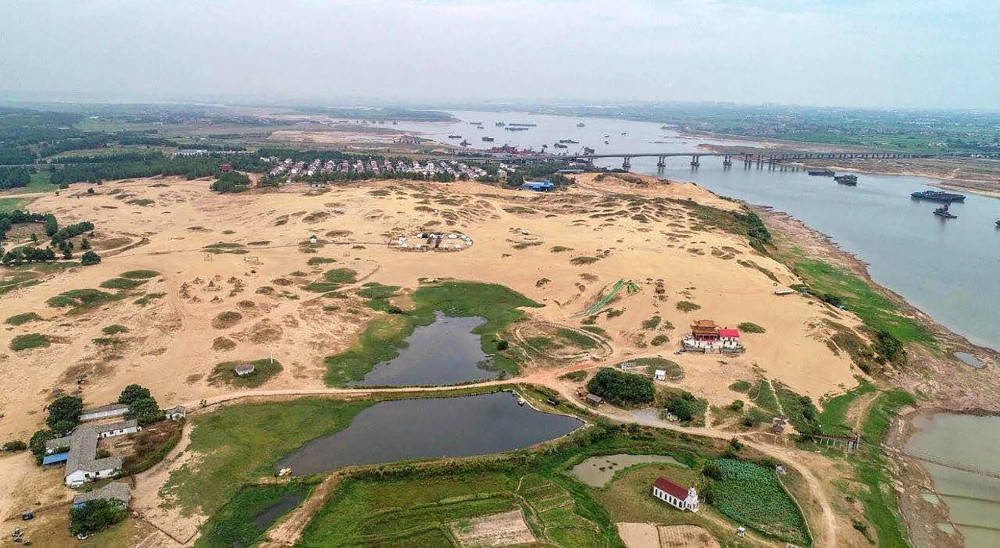 湖南不临海却有沙滩,是我国第一大人工沙漠,有"江南戈壁"之称_大漠