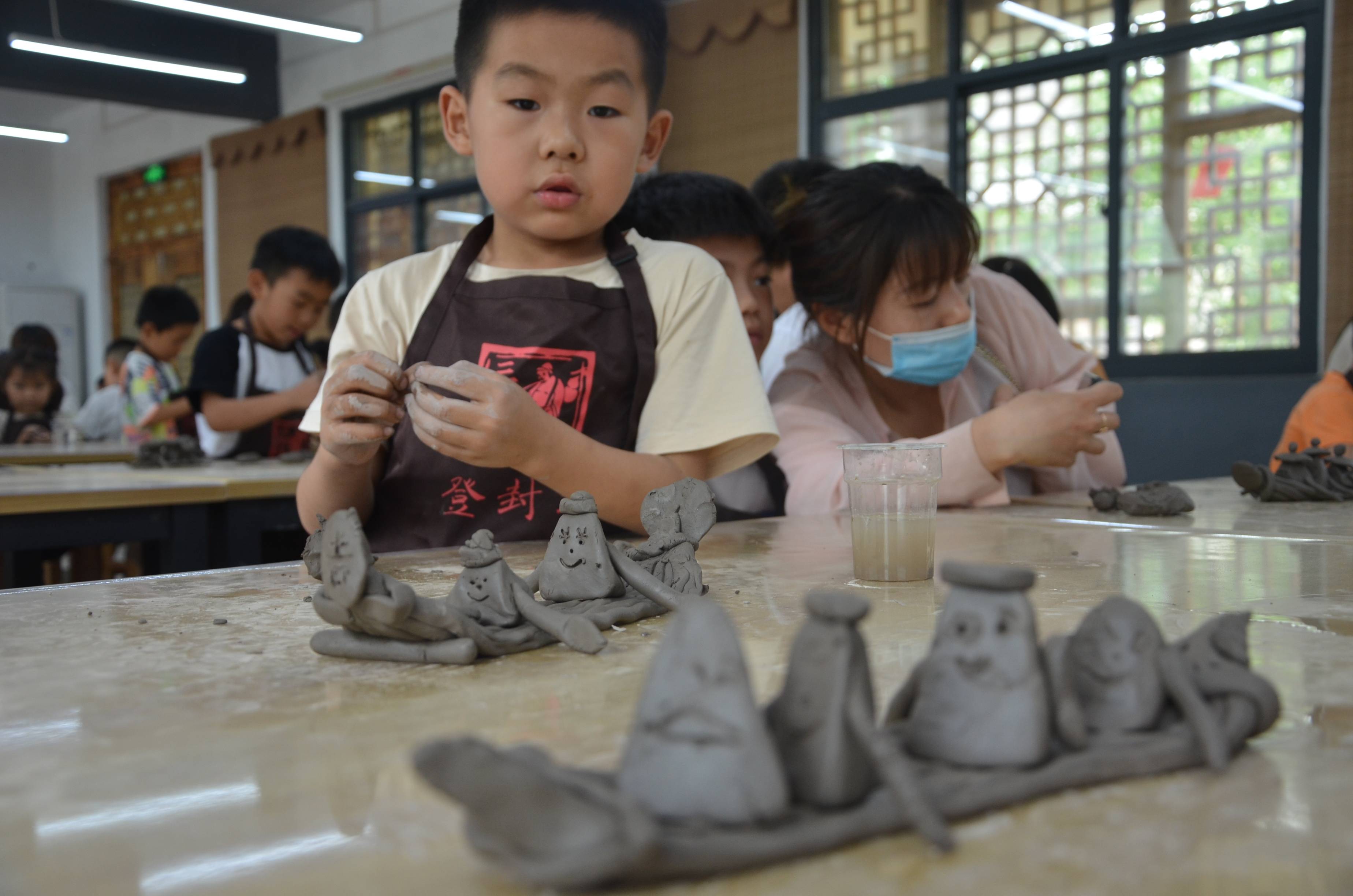 当文化和自然遗产日遇上端午节——亲子互动做陶艺 卡通粽子赛龙舟