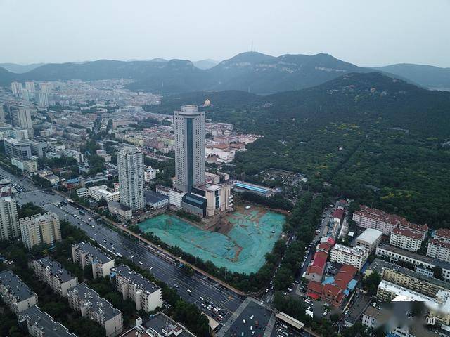 航拍!千佛山要建北广场,20多年"烂尾楼"齐鲁宾馆二期将拆除