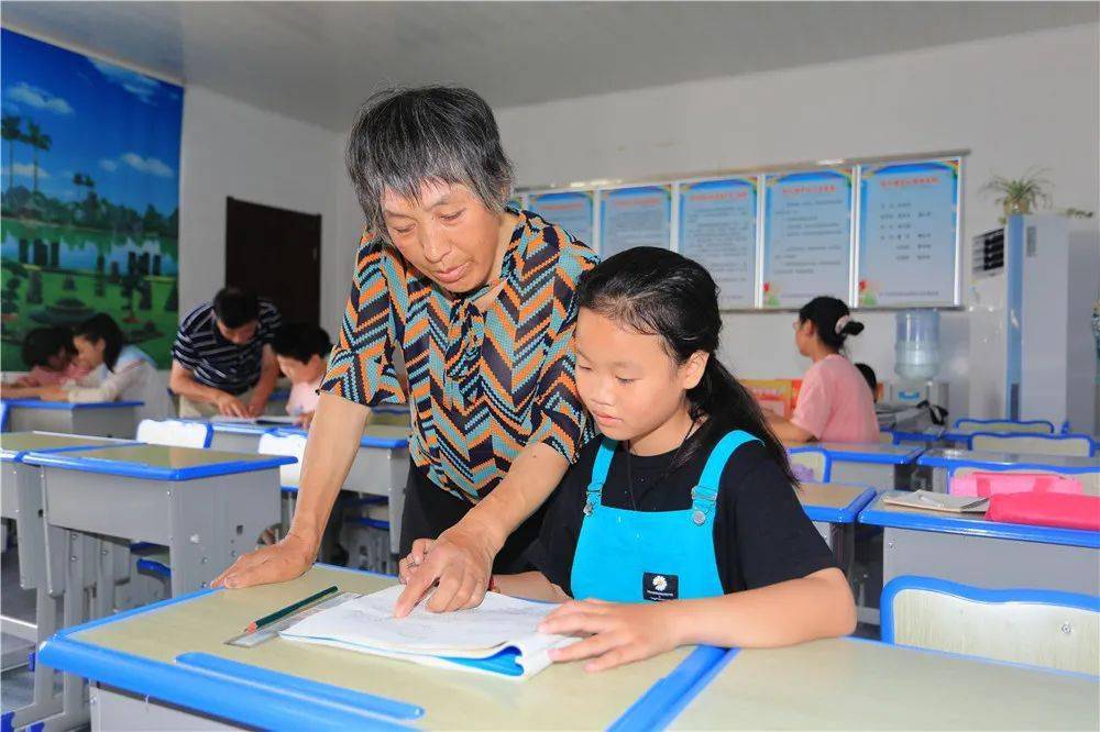 学习,使她的幸福感得到了提升,在活动时,她时常与孩子们一起分享着