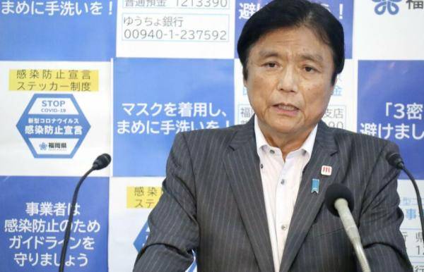福冈县知事小川洋在记者会上发言(共同社)