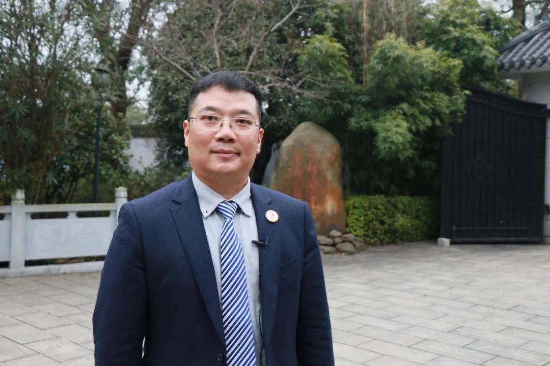 67委员风采唐铁军聚焦城市停车难为营商环再优化建言献策