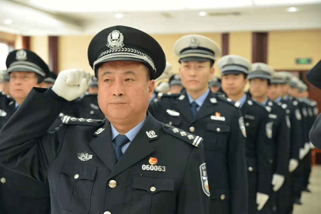 交口县公安局举行中国人民警察节向警旗宣誓活动