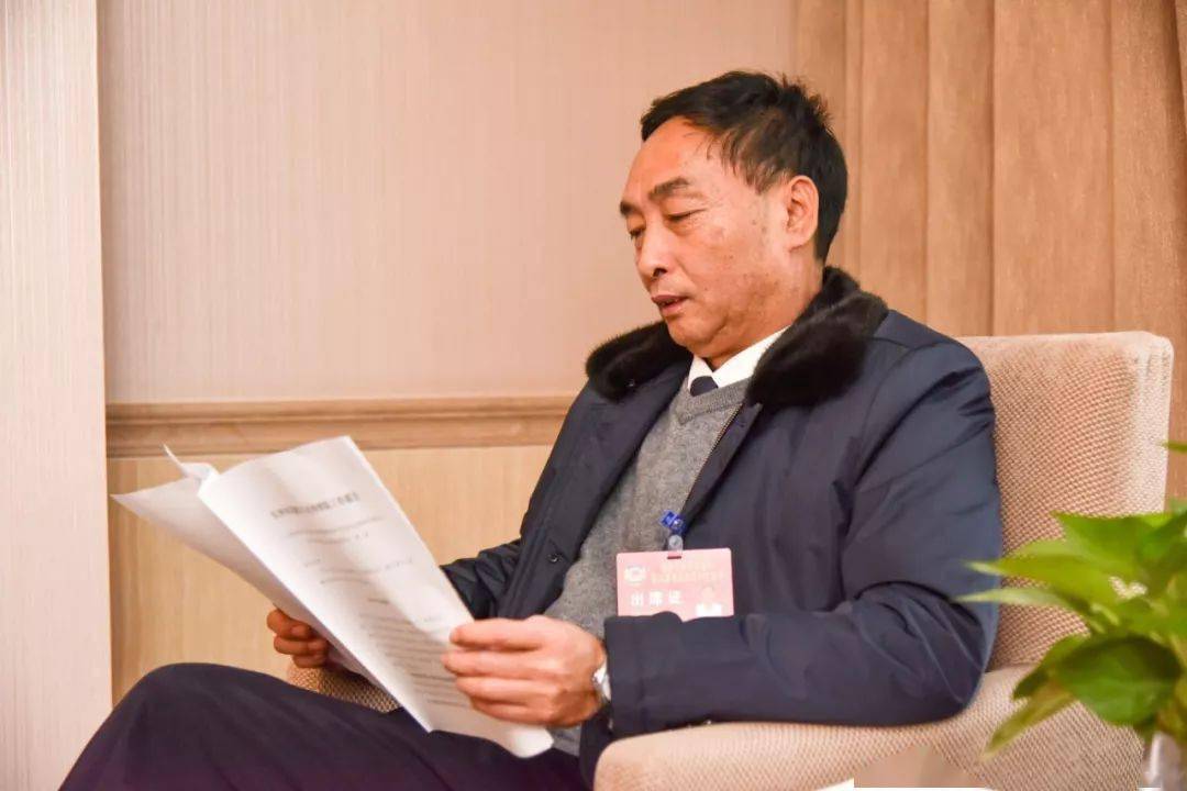 政协委员风采谢建良聚焦农安小区做好民情代言人
