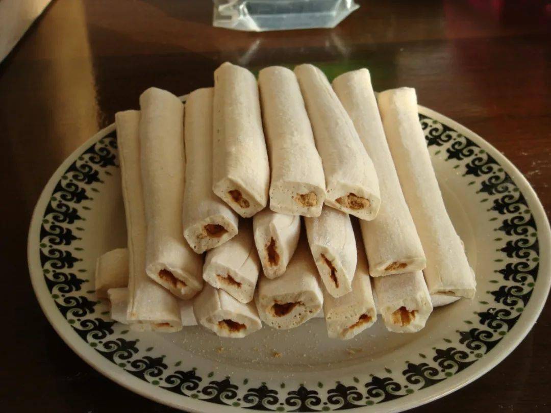 今儿小年麻糖你来一根吗