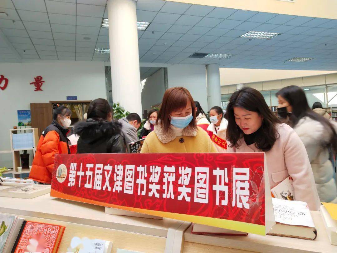 赏春意品书香暖万家中卫市图书馆开展写春联送祝福活动