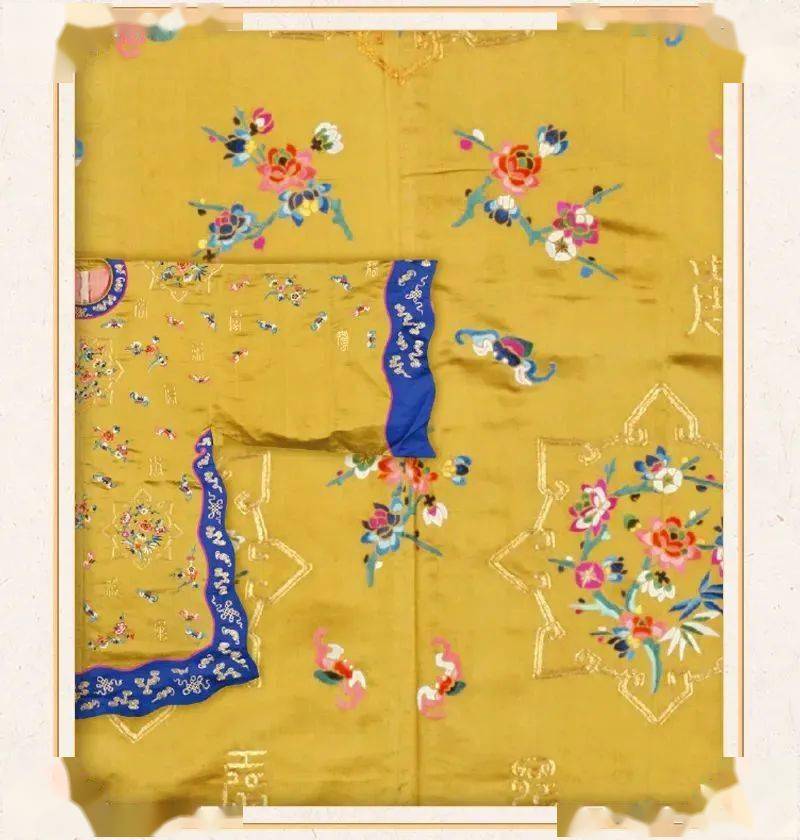 月色缎绣牡丹蝶金团寿字纹花神衣故宫博物院藏即以二月十二日为花朝日