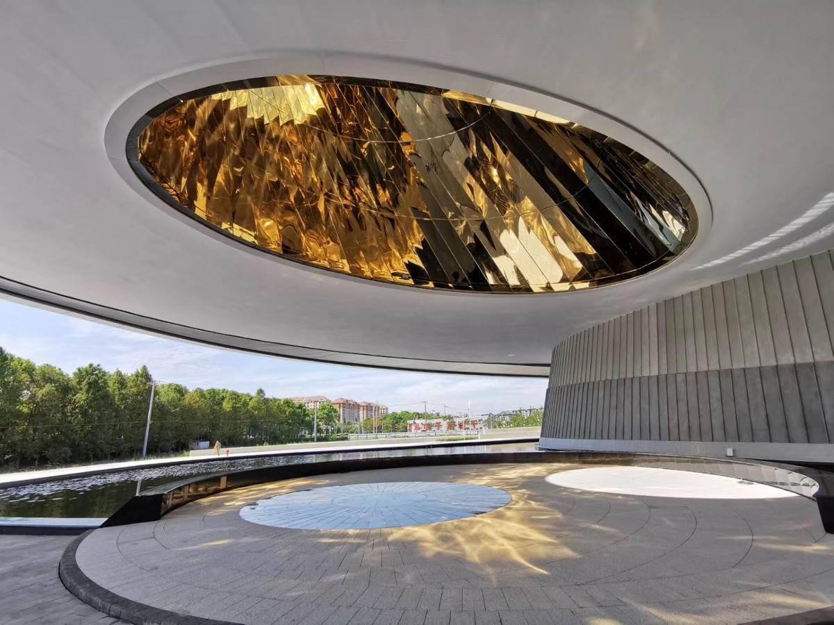 上海天文馆球体与滴水湖大小比例,与地球,太阳比例相符_建筑