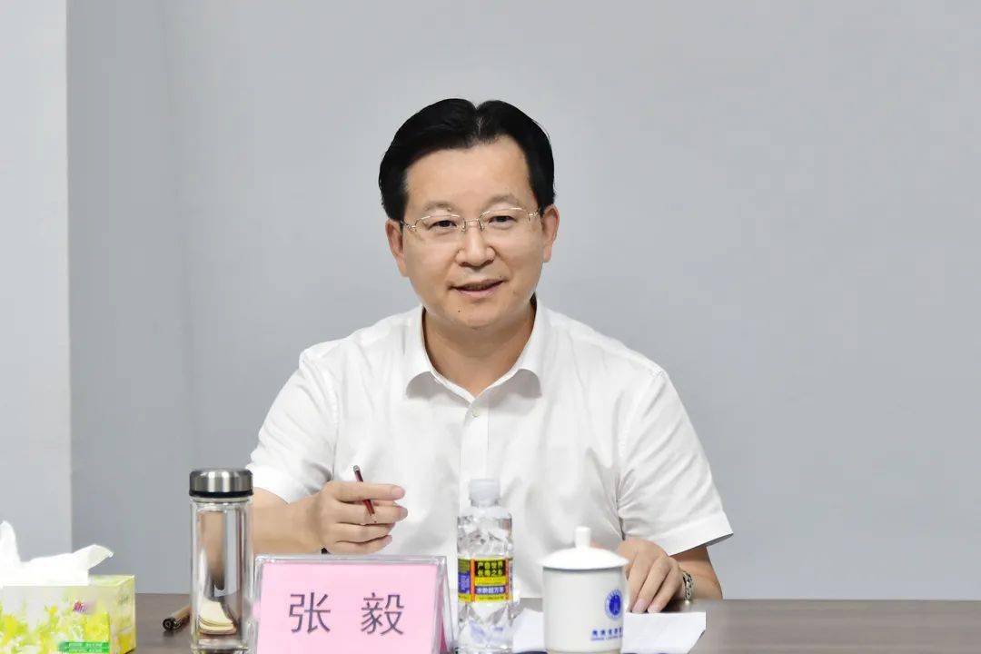 张毅到省律师协会走访座谈_保障