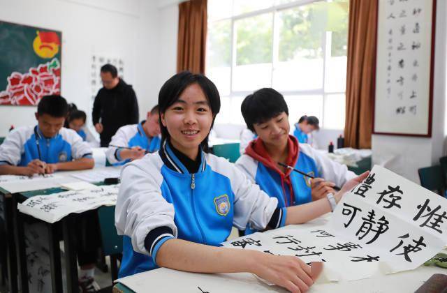 张学军|【图片新闻】洱海湖畔民族花开