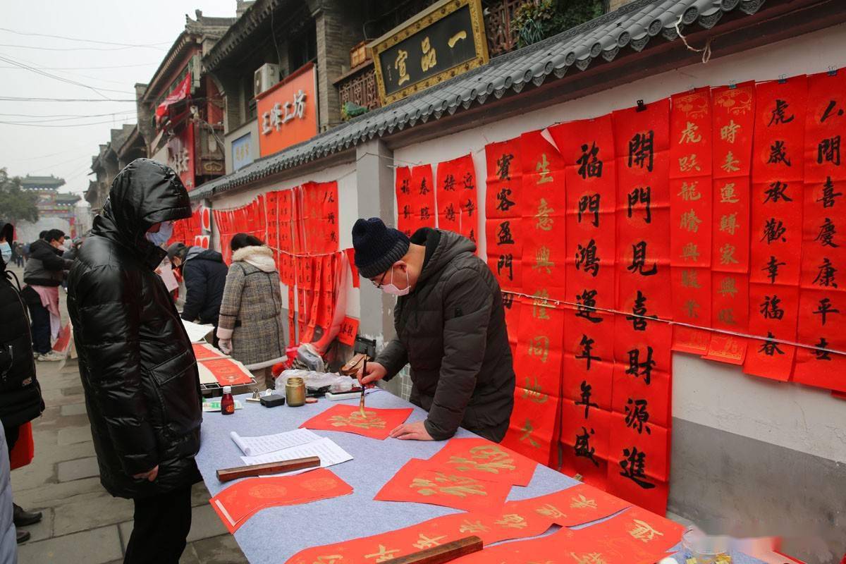 書院門古文化街:春聯紅,年味濃,最小的書寫者只有5歲_祝福_孩子_書法