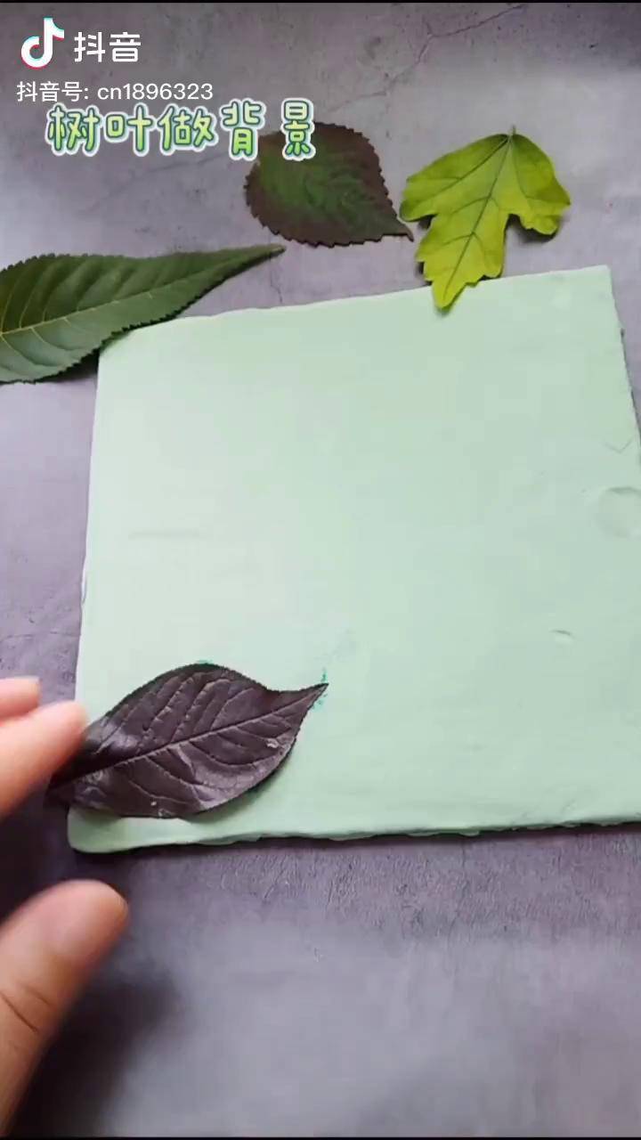 粘土背景上树叶也会画画超轻粘土教师节礼物