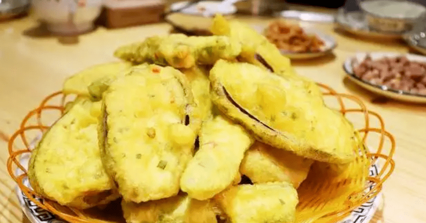 赣州的油炸米果酥脆的口感让你一口就停不下来哦