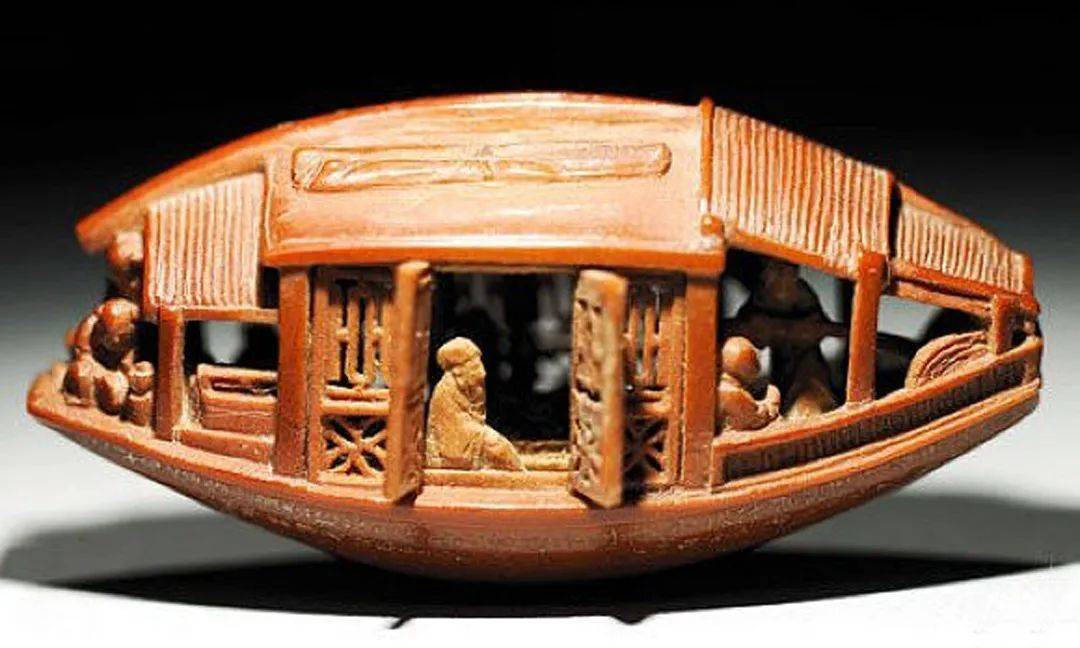 "橄榄核舟民国初年,舟山人殷根泉,殷根福兄弟以佛教经典人物为题材,用